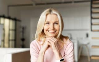 mature woman smiling with teeth